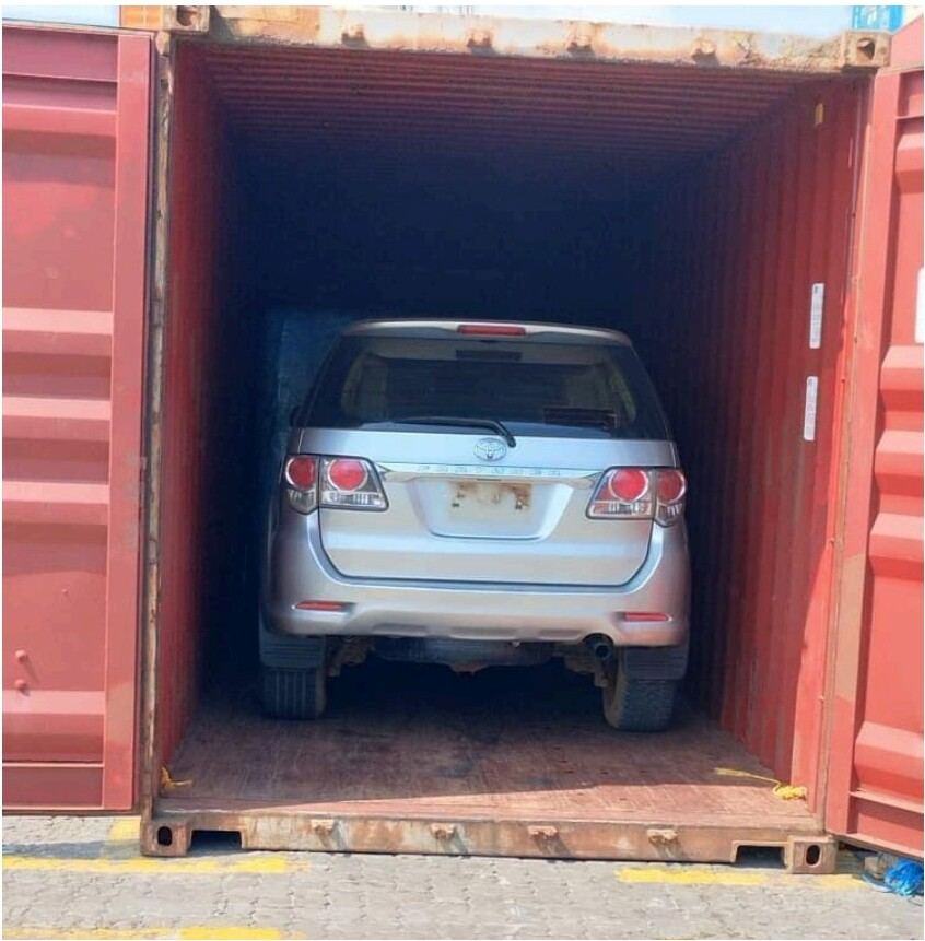 SUV inside an open shipping container