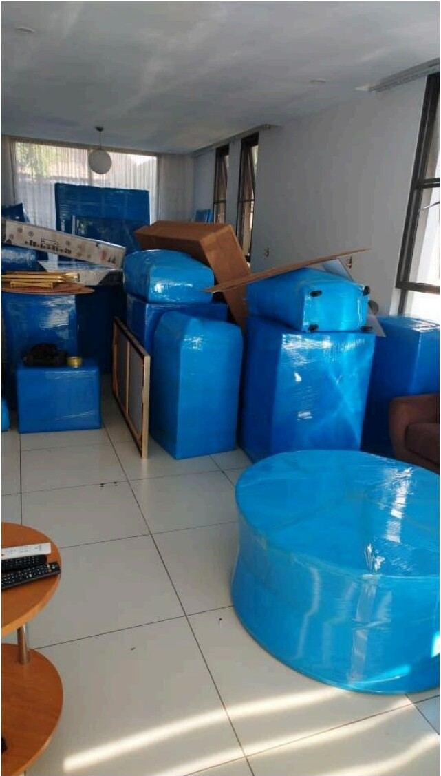 Furniture wrapped and secured for sea shipment